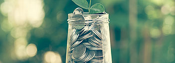 Förderung Heizungstausch: Glas mit Geld