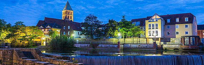 Klempner Heizungsbauer Rheine Fluss Stadt Kirchturm Nacht