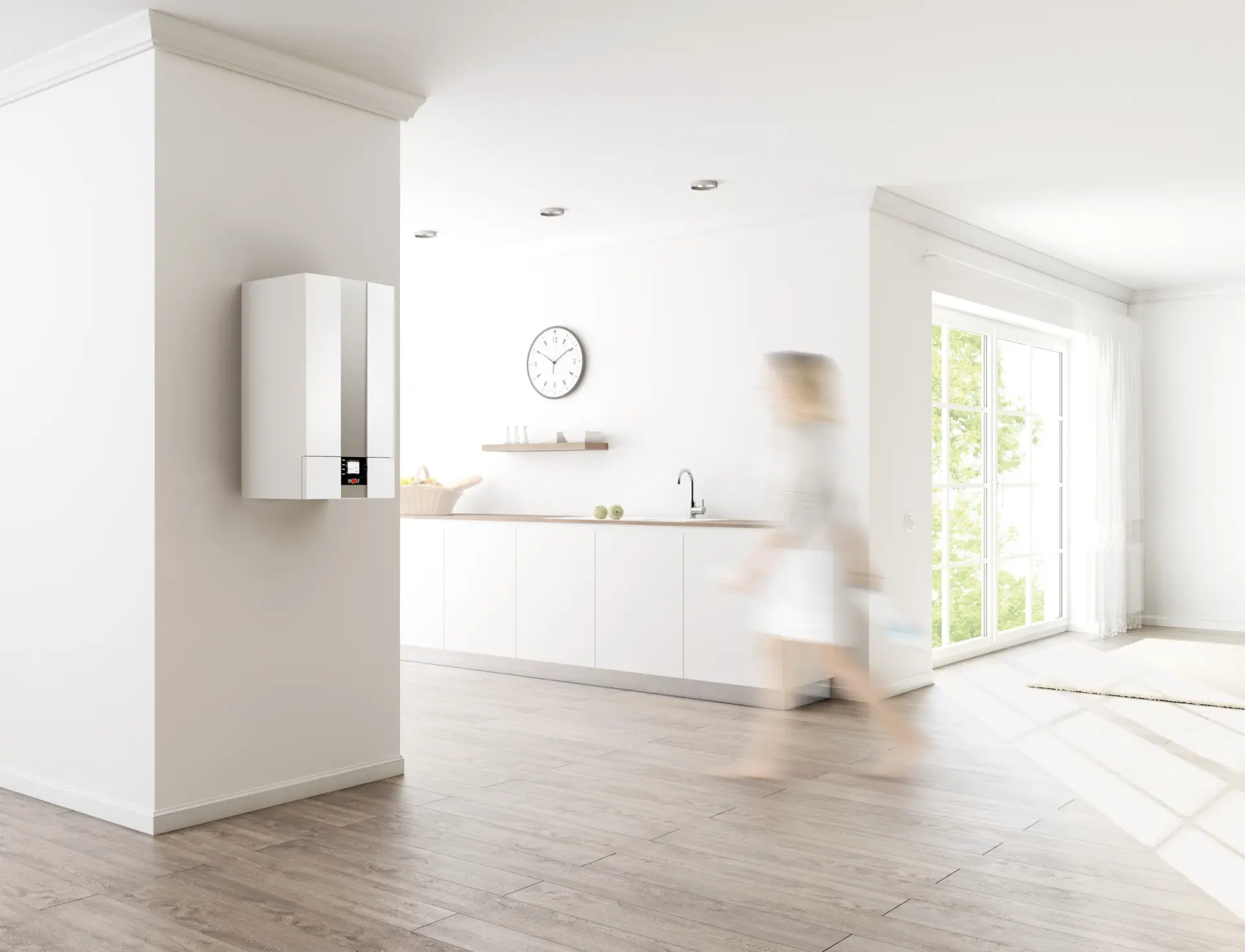Heizen mit Gas: Gasbrennwerttherme CGW-2 von WOLF in sonnendurchflutetem Bad