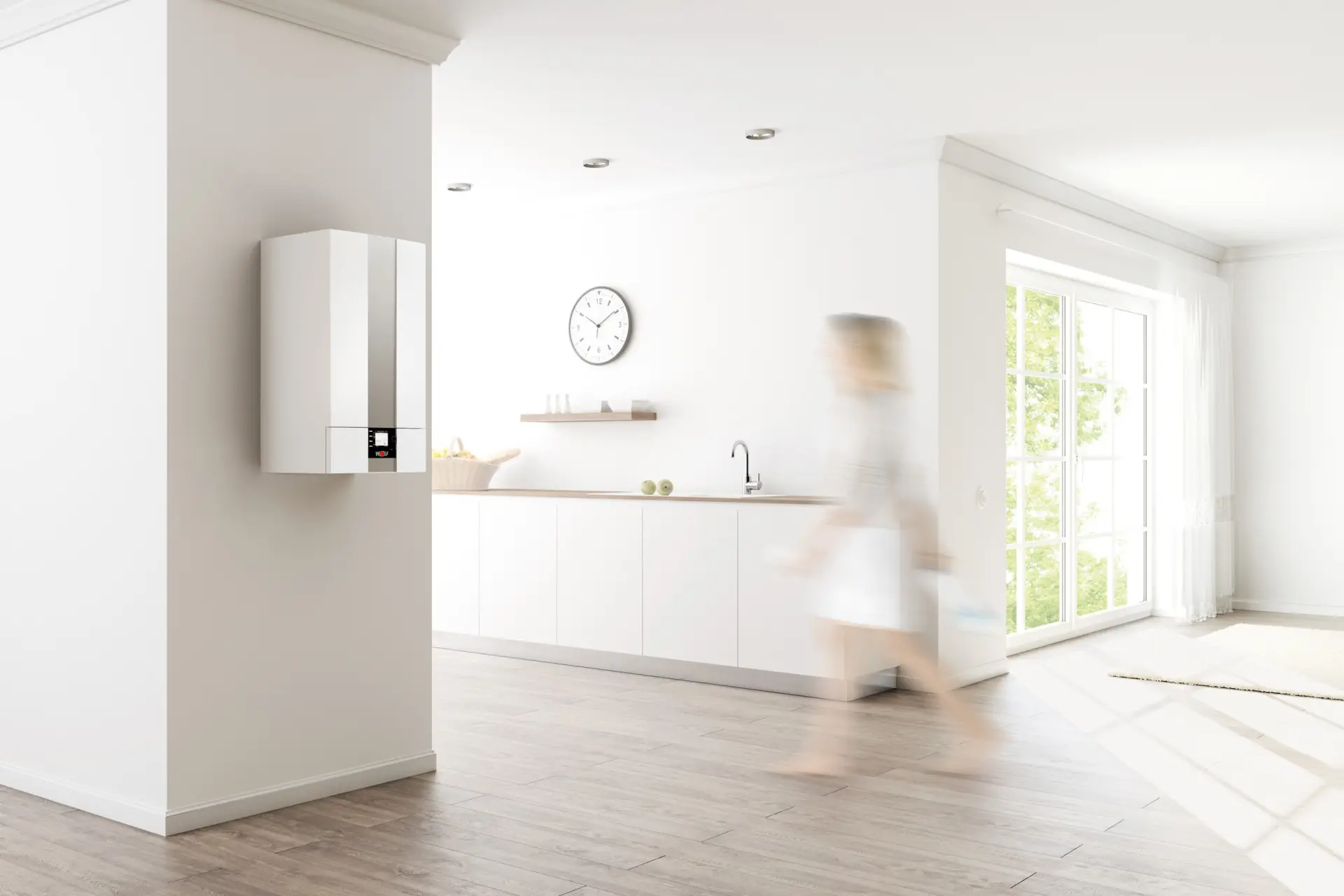 Heizen mit Gas: Gasbrennwerttherme CGW-2 von WOLF in sonnendurchflutetem Bad