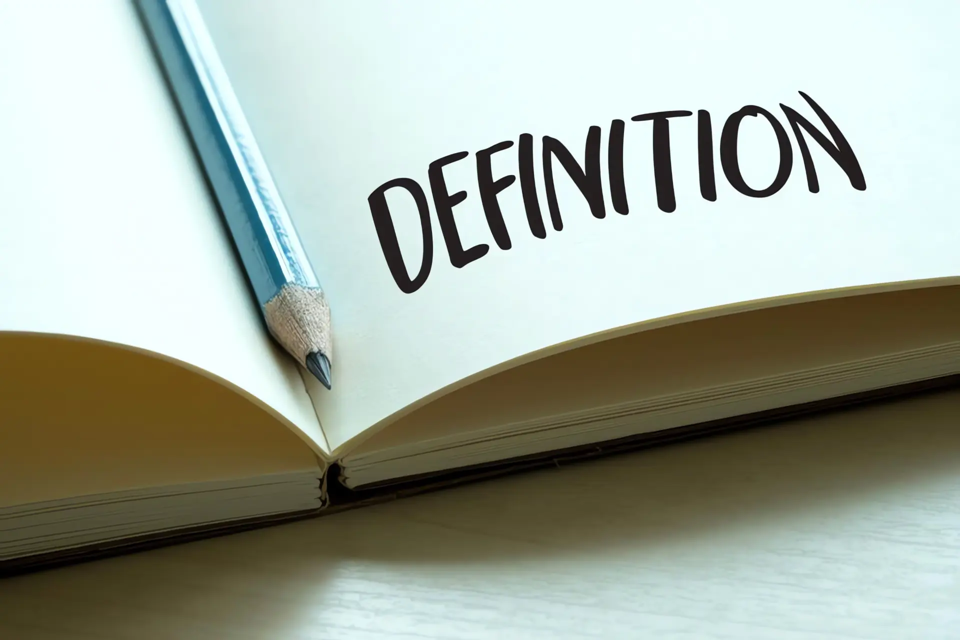 Heizwert Brennwert: Offenes Buch mit Definition Schriftzug