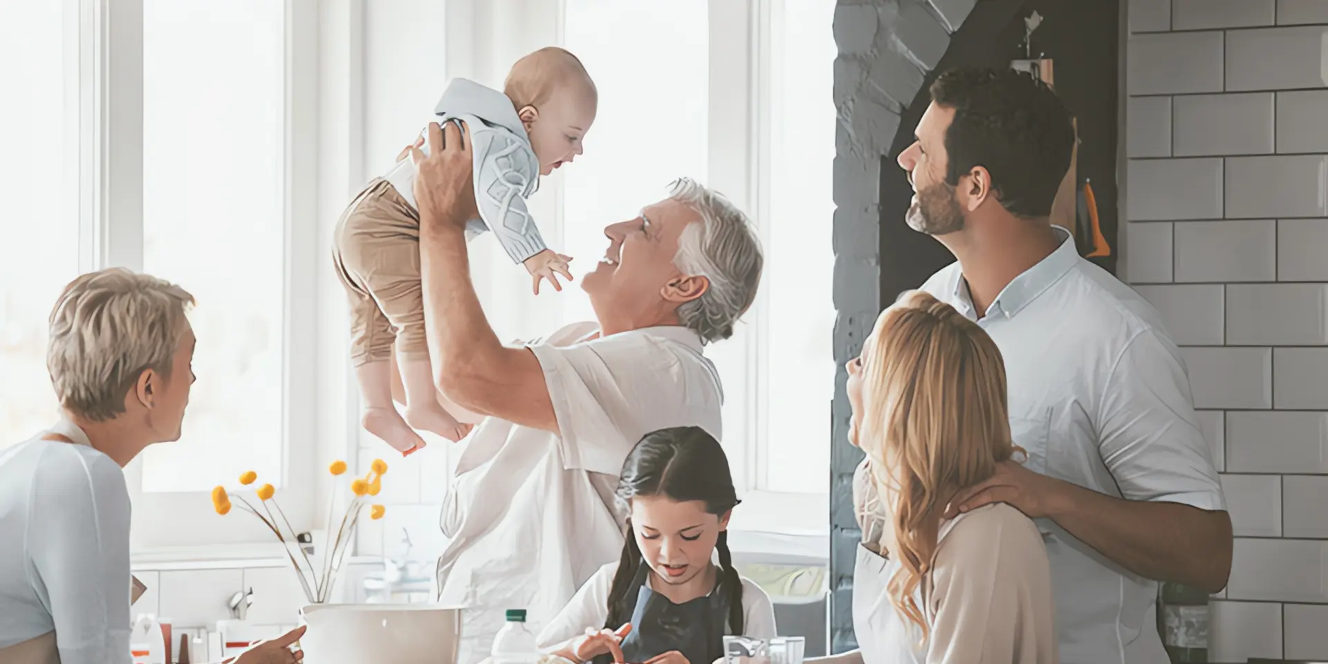 Familie in der Küche mit allen Generationen interagiert